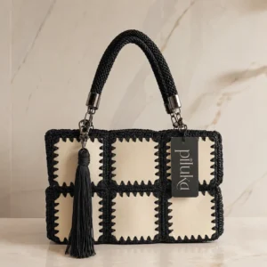Bolso de mano mujer Nur con asas de crochet y piel vegana.