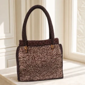 Bolso Elif de hombro en crochet vegano color cobre y chocolate con asas artesanales.
